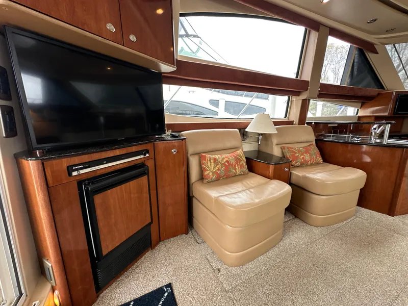 Slide: The Image of Luxurious interior of a 2008 Meridian 391 Sedan yacht with plush seating and modern amenities. - 23