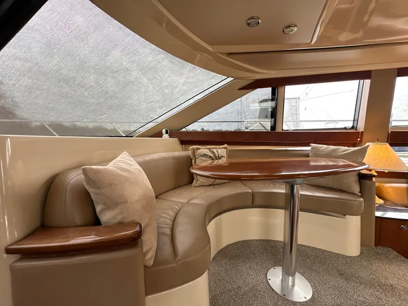 Slide: The Image of Luxurious interior of a 2008 Meridian 391 Sedan yacht with plush seating and elegant table. - 26