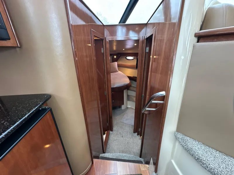 Slide: The Image of 2008 Meridian 391 Sedan interior with wood finish and cozy cabin view. - 31
