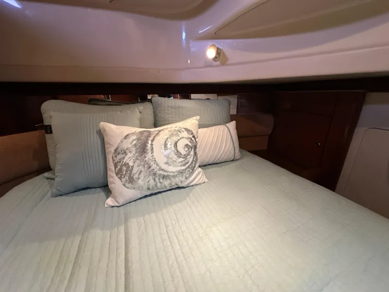 Slide: The Image of Cozy bedroom in 2008 Meridian 391 Sedan with decorative pillows and soft lighting. - 38