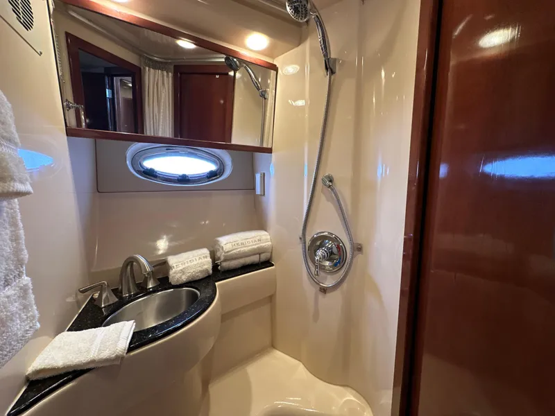 Slide: The Image of Luxurious bathroom in 2008 Meridian 391 Sedan yacht with modern fixtures and elegant design. - 39