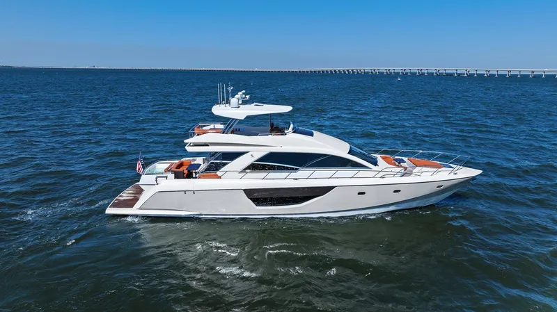 The Image of Luxurious 2013 Cheoy Lee 76 Alpha yacht cruising on open water. - 0