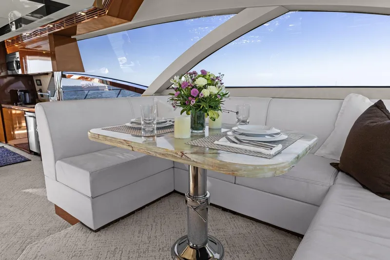 Slide: The Image of Luxurious interior of 2013 Cheoy Lee 76 Alpha yacht with elegant dining area. - 19
