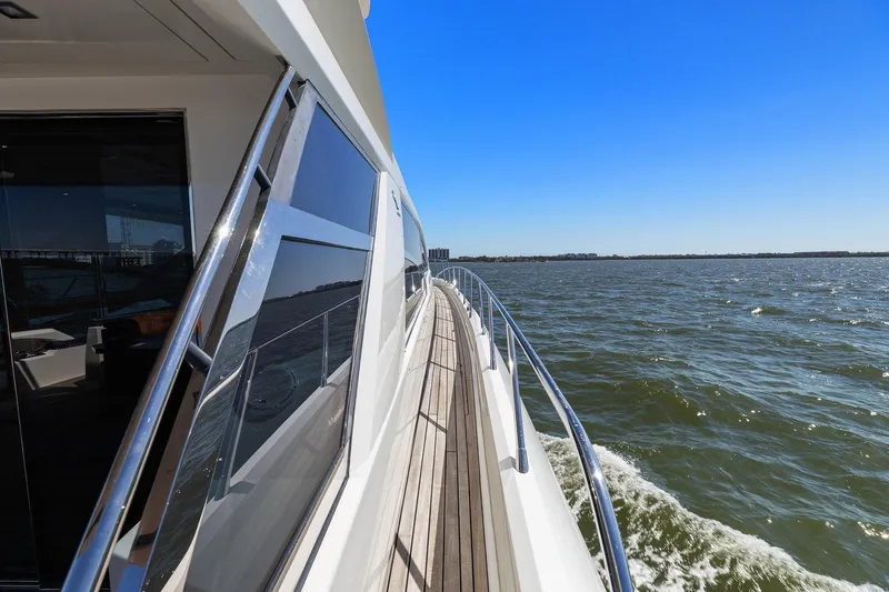 Slide: The Image of Cheoy Lee 76 Alpha yacht cruising on open water, 2013 model, sunny day. - 22