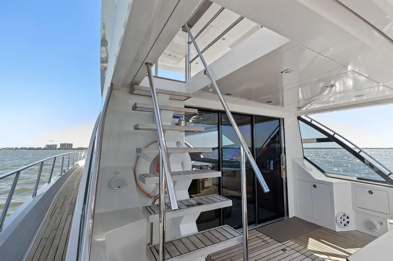 Slide: The Image of 2013 Cheoy Lee 76 Alpha yacht deck with stairs and ocean view. - 24