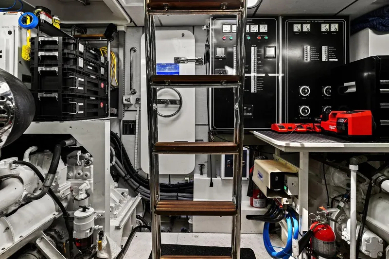 Slide: The Image of Engine room of 2013 Cheoy Lee 76 Alpha yacht with control panels and equipment. - 31