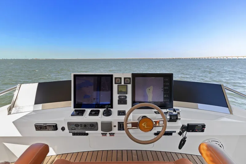 Slide: The Image of Helm of 2013 Cheoy Lee 76 Alpha yacht with navigation screens and ocean view. - 39