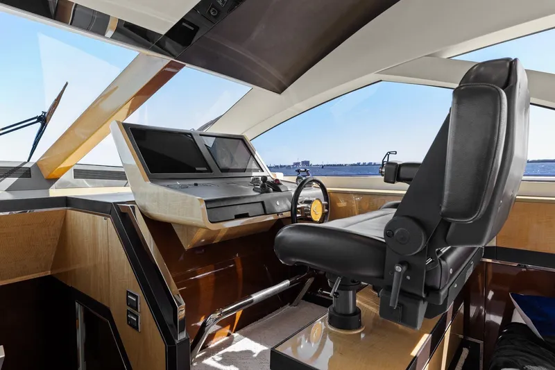 Slide: The Image of Helm of 2013 Cheoy Lee 76 Alpha yacht with modern controls and panoramic view. - 47