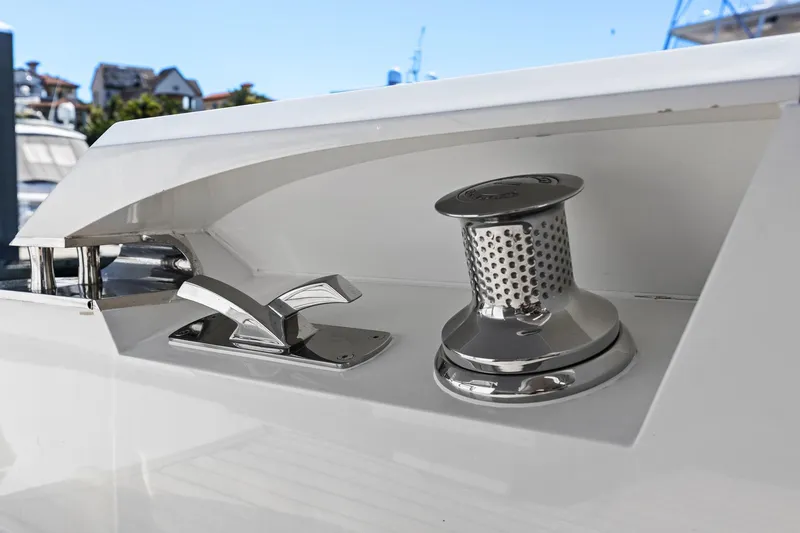 Slide: The Image of 2013 Cheoy Lee 76 Alpha yacht deck detail with winch and cleat. - 5
