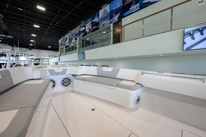Slide: The Image of 2025 Contender 39 ST boat interior with sleek seating and modern design. - 2