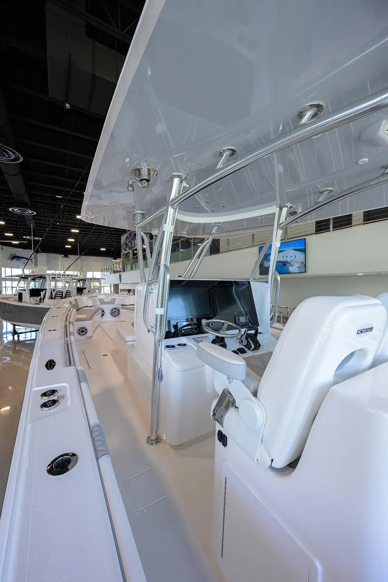 Slide: The Image of 2025 Contender 39 ST boat interior with sleek design and advanced navigation equipment. - 20