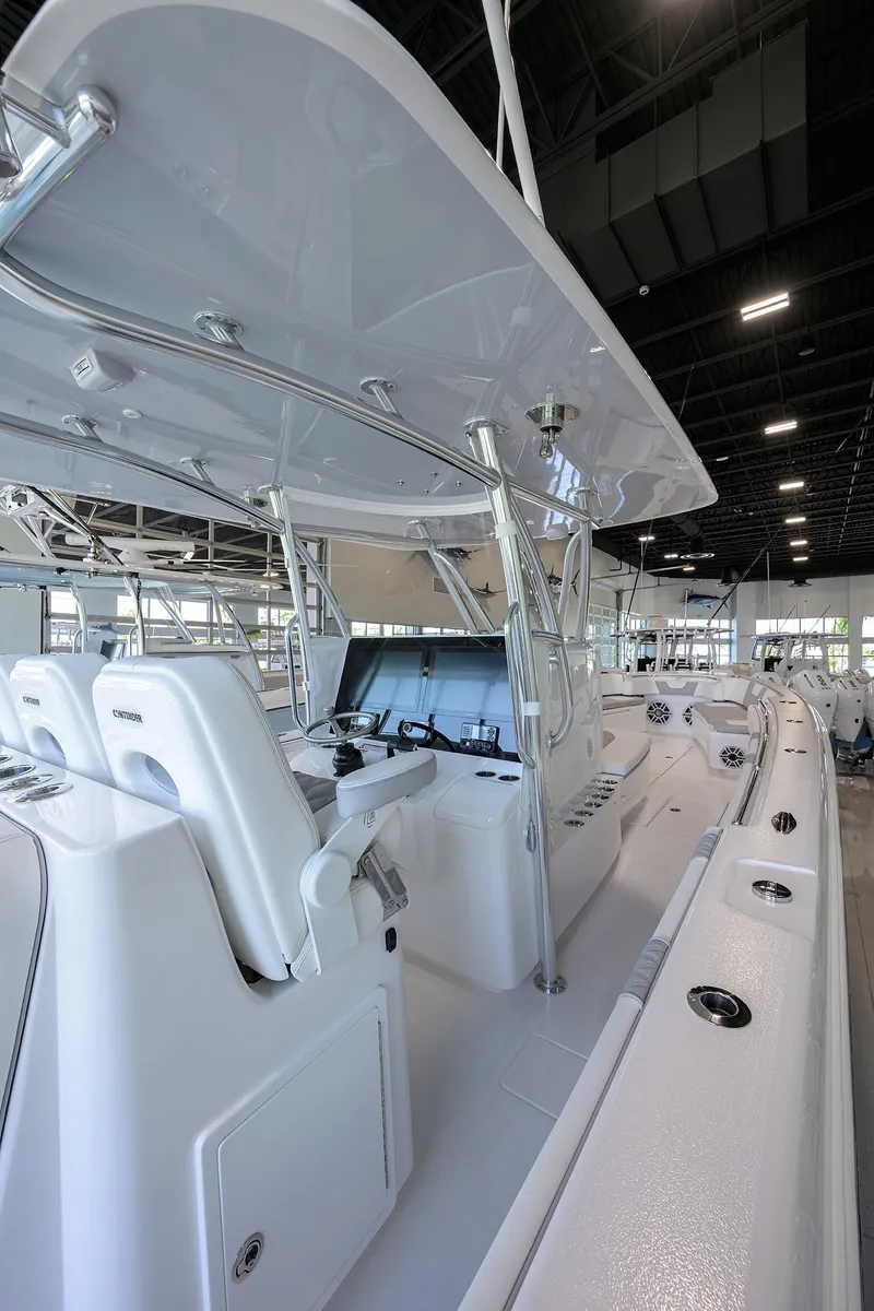 Slide: The Image of 2025 Contender 39 ST boat interior with sleek design and advanced navigation system. - 27