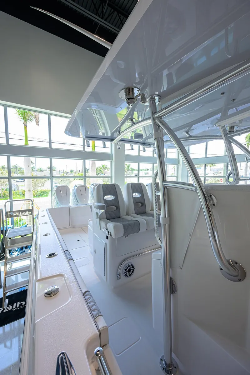 Slide: The Image of 2025 Contender 39 ST boat interior with sleek design and modern seating. - 28