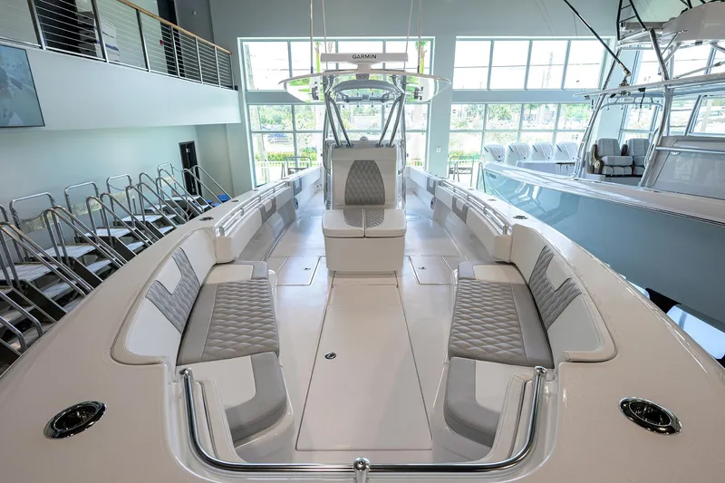 Slide: The Image of 2025 Contender 39 ST boat interior with sleek seating and modern design. - 6