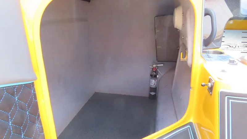 Slide: The Image of Interior cabin of a 2010 MTI 48 R/P boat with a fire extinguisher. - 11