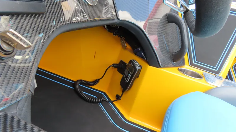 Slide: The Image of Interior of 2010 MTI 48 R/P boat with carbon fiber and yellow accents. - 15