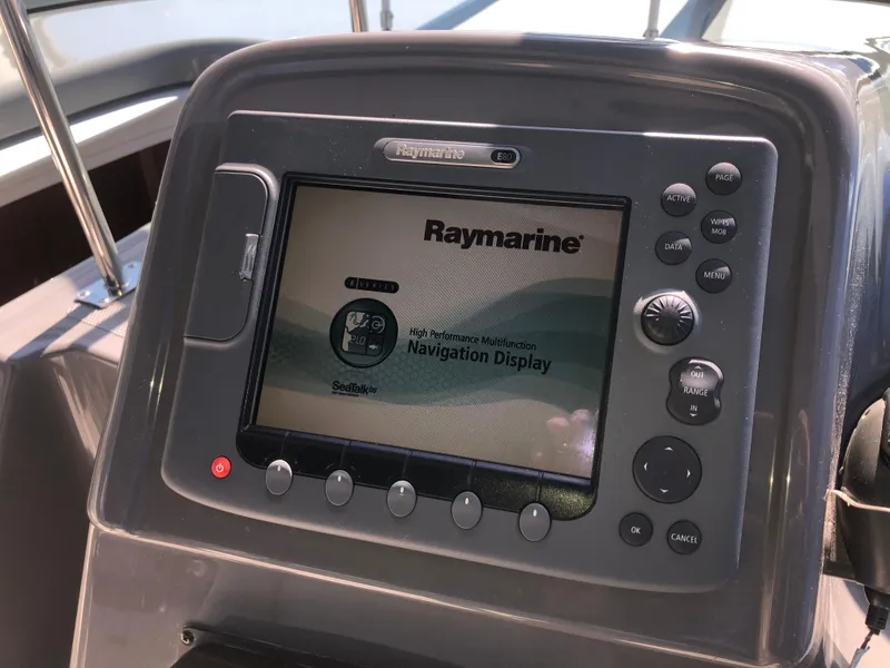 Slide: The Image of Raymarine navigation display on 2007 Cruisers Yachts 340 Express dashboard. - 23