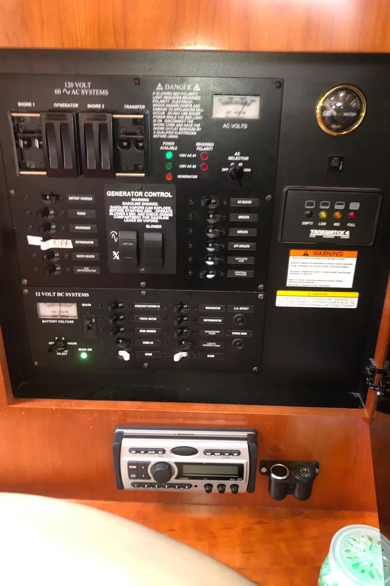 Slide: The Image of Electrical control panel of 2007 Cruisers Yachts 340 Express boat. - 36