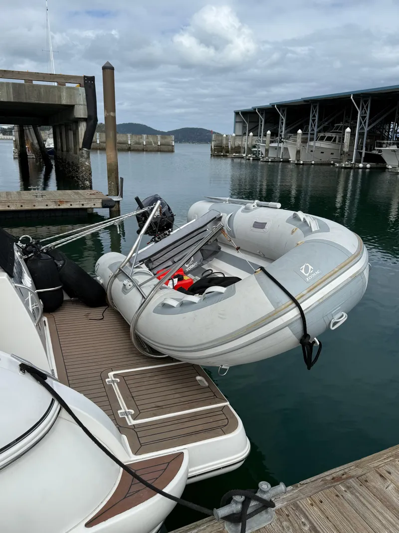 Slide: The Image of Inflatable boat docked beside a 2007 Cruisers Yachts 340 Express. - 9