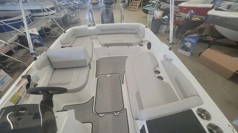 Slide: The Image of 2025 Hurricane SunDeck Sport 185 OB interior with spacious seating and modern design. - 5