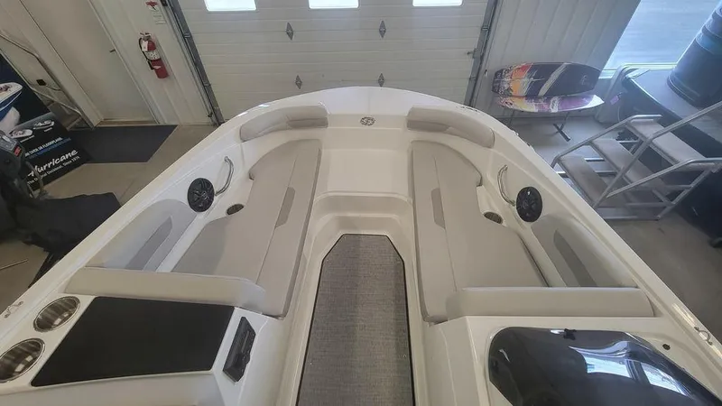 Slide: The Image of 2025 Hurricane SunDeck Sport 185 OB interior with spacious seating and modern design. - 9
