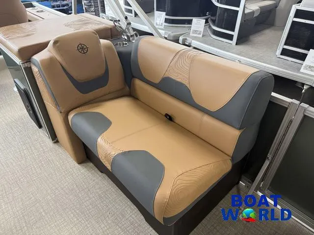 Slide: The Image of 2025 Tahoe Geofish 2385 boat seat with tan and gray upholstery at Boat World showroom. - 10