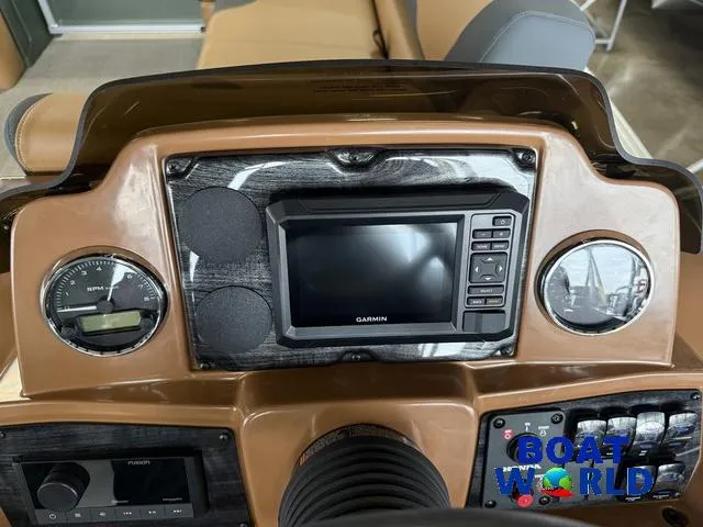 Slide: The Image of Dashboard of 2025 Tahoe Geofish 2385 with Garmin display and controls. - 15