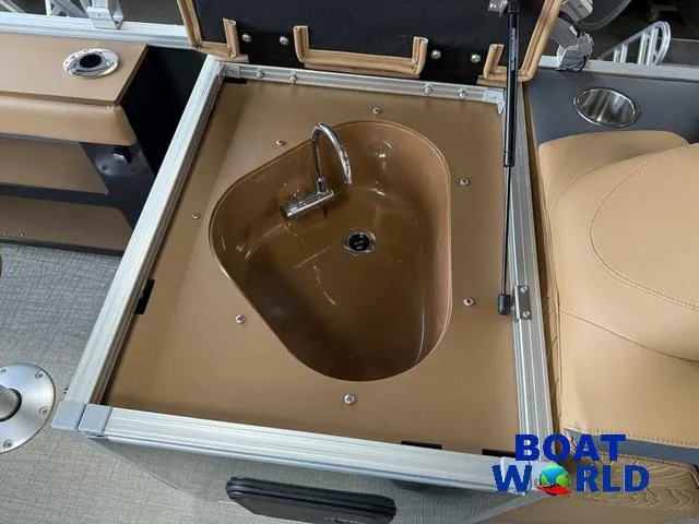 Slide: The Image of Sink in Tahoe Geofish 2385 boat, featuring a compact design and modern faucet. - 19