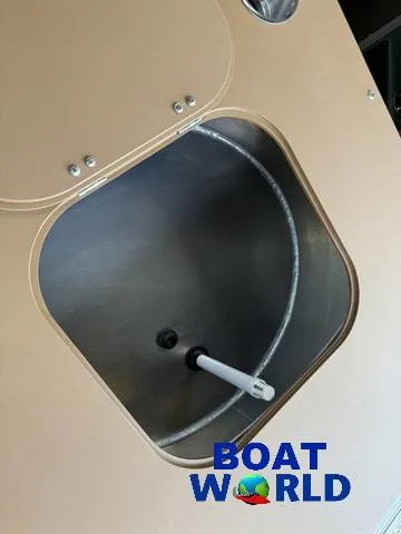 Slide: The Image of Livewell compartment in 2025 Tahoe Geofish 2385 Rear Fish boat at Boat World. - 27