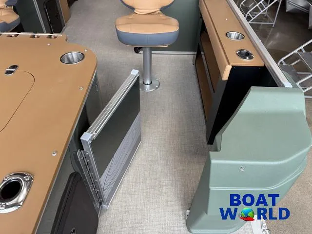 Slide: The Image of 2025 Tahoe Geofish 2385 interior with seating and storage, featuring Boat World branding. - 32