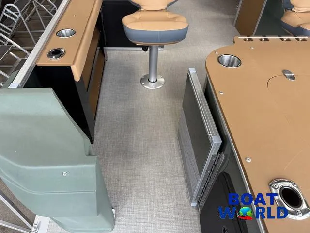 Slide: The Image of 2025 Tahoe Geofish 2385 boat interior with seating and storage compartments. - 33