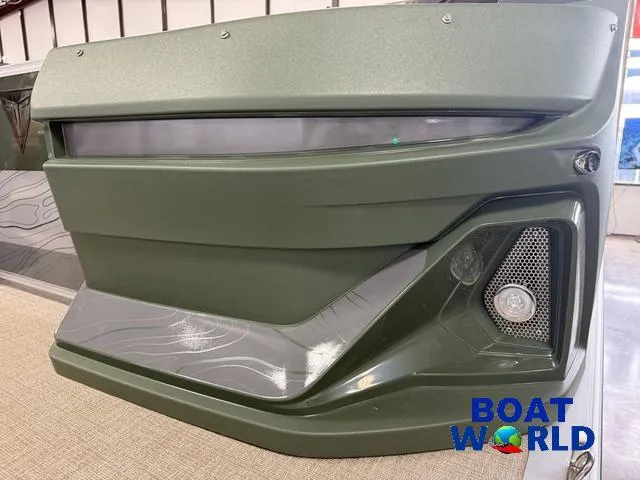 Slide: The Image of 2025 Tahoe Geofish 2385 boat panel with sleek design at Boat World showroom. - 38