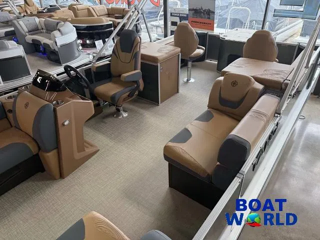 Slide: The Image of Interior of 2025 Tahoe Geofish 2385 boat with tan seating and modern design. - 4