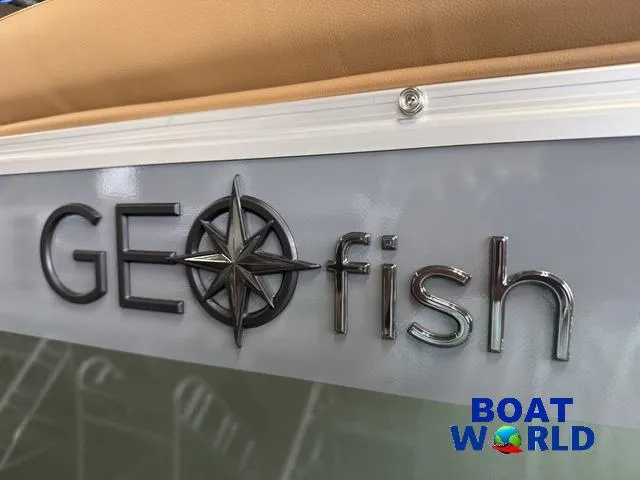 Slide: The Image of 2025 Tahoe Geofish 2385 logo with compass design at Boat World. - 41