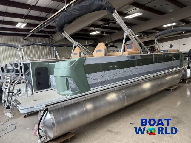 Slide: The Image of 2025 Tahoe Geofish 2385 pontoon boat in showroom, featuring Honda 4-Stroke EFI engine. - 45