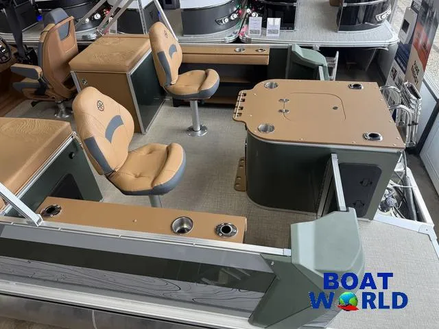 Slide: The Image of 2025 Tahoe Geofish 2385 boat interior with tan seating and fishing setup at Boat World. - 5