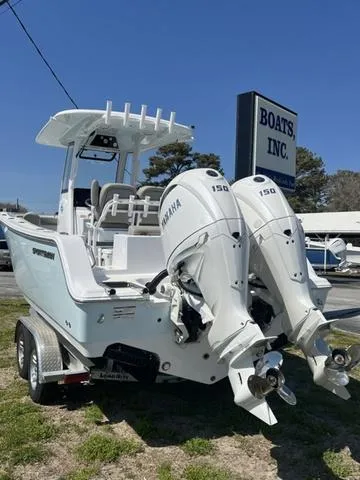 Slide: The Image of 2025 Sportsman Open 252 boat with dual Yamaha 150 engines at Boats Inc. dealership. - 2