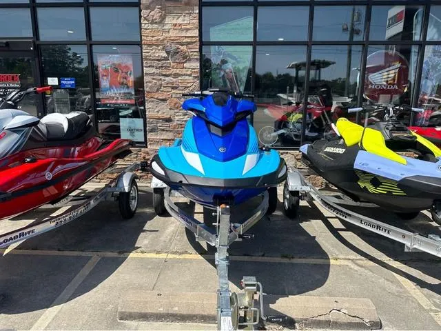 Slide: The Image of 2025 Yamaha WaveRunner VX in vibrant blue, side view. - 2