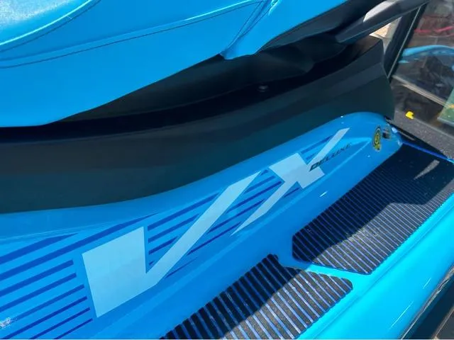 Slide: The Image of 2025 Yamaha WaveRunner VX jet ski speeding on water, rider wearing life vest. - 5