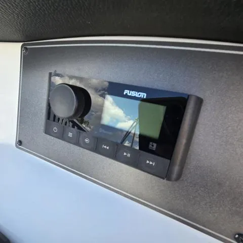 Slide: The Image of 2023 Hurricane Sundeck Sport 218 OB boat stereo system with Fusion audio controls. - 14