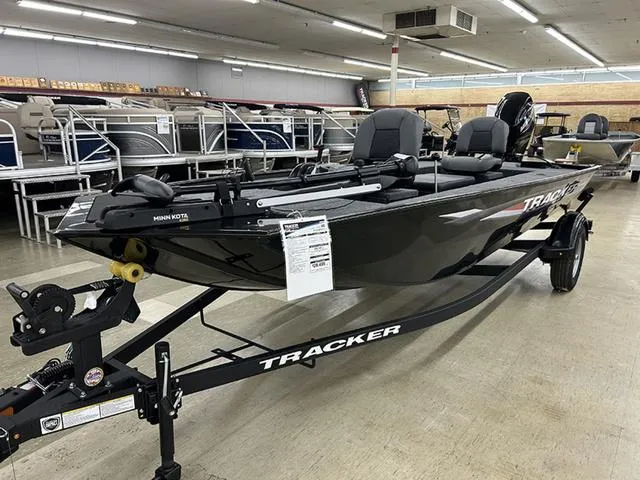 Slide: The Image of 2025 Tracker Panfish™ 17 boat on display in showroom with trailer. - 10