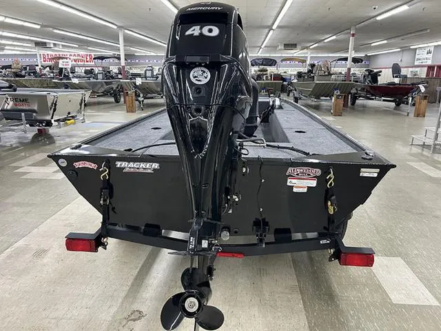 Slide: The Image of 2025 Tracker Panfish™ 17 boat with Mercury 40 engine displayed indoors. - 5