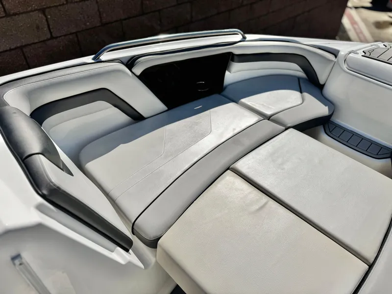 Slide: The Image of 2020 Yamaha AR240 boat interior with sleek, modern seating design. - 14