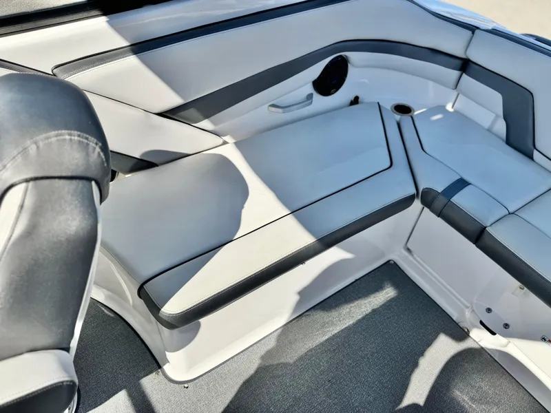 Slide: The Image of 2020 Yamaha AR240 boat interior with sleek seating and modern design. - 23