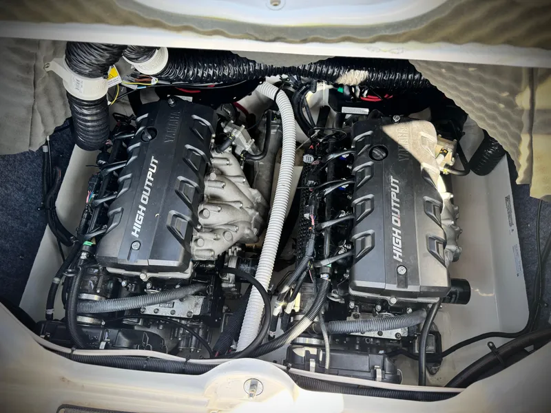 Slide: The Image of 2020 Yamaha AR240 boat engine compartment with dual high-output engines. - 25