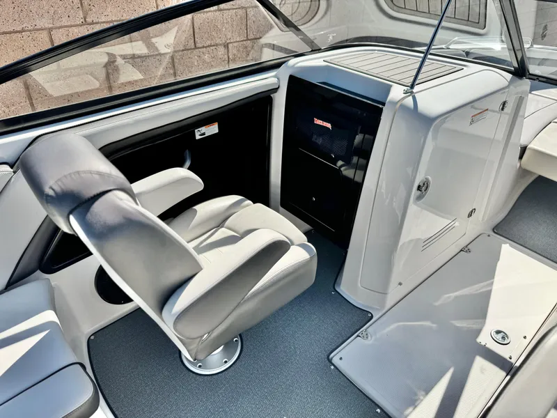 Slide: The Image of 2020 Yamaha Boats AR240 interior with sleek seating and modern dashboard design. - 26