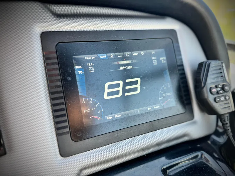 Slide: The Image of Dashboard of 2020 Yamaha AR240 boat showing speed and controls. - 35