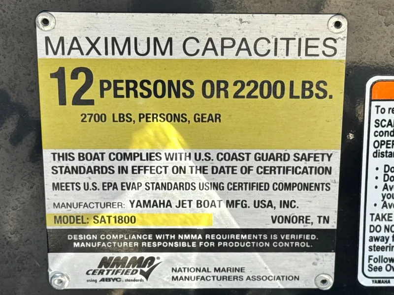 Slide: The Image of Yamaha AR240 2020 capacity plate: 12 persons or 2200 lbs, NMMA certified. - 43