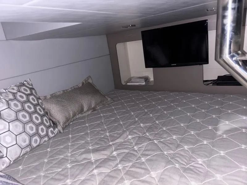 Slide: The Image of Cozy cabin interior of 2019 Formula 350 Crossover Bowrider with bed and TV. - 14