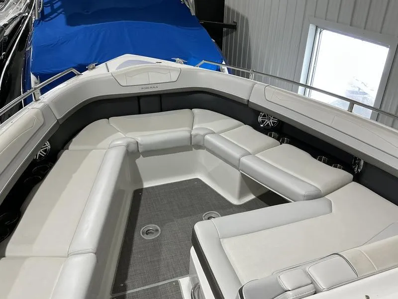 Slide: The Image of 2019 Formula 350 Crossover Bowrider with spacious seating in a sleek, modern design. - 21